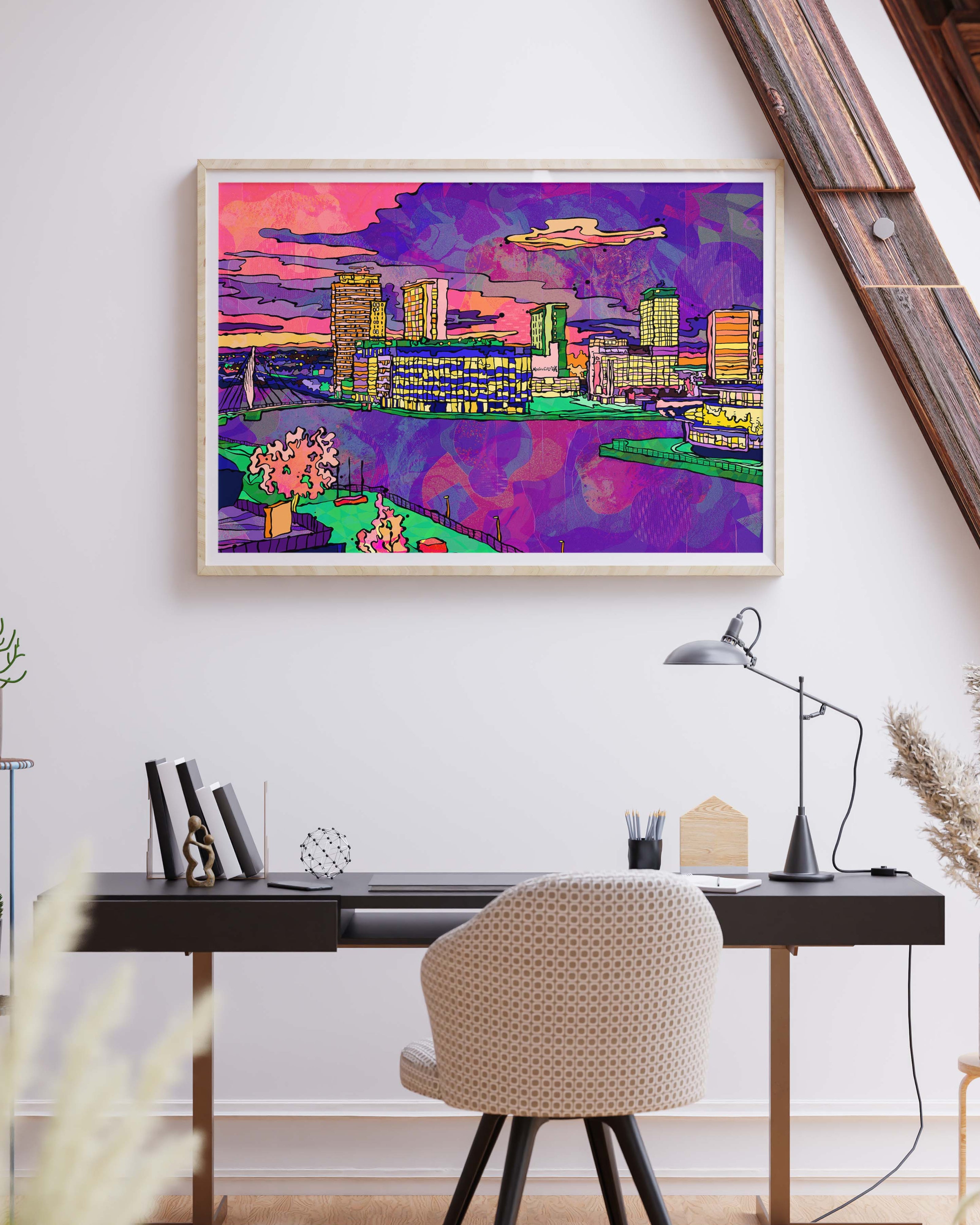 Modern home office with a desk, chair, and colourful framed psychedelic art print on the wall by Jasmin Issaka